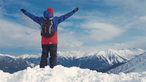 Man With Backpack Standing On Snowy Mountain Stock Footage Sbv Storyblocks