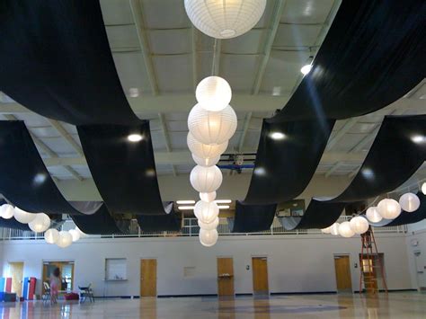 Choose from our selection of crab decor as part of our nautical decor by theme categories. Ceiling drape | View from the end of the gym. Black fabric ...