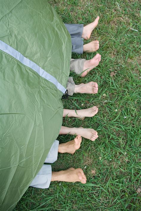 Young Friends In Tent Feet Sticking License Image 70506763 Image Professionals