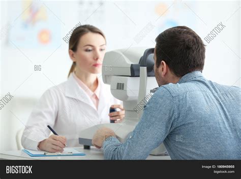 Female Doctor Examining Adult Male Image And Photo Bigstock