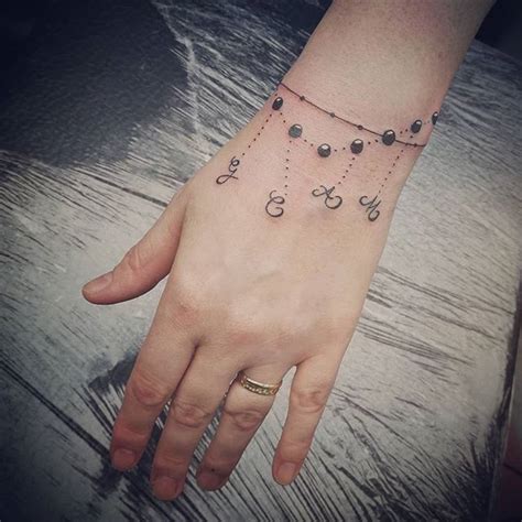 A wrist bracelet tattoo is also known as a cuff tattoo or band tattoo. Tattoo Bracelets Are About to Become Your New Favorite ...