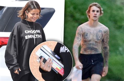 selena hugs bible justin shows off tattooed abs after breakup