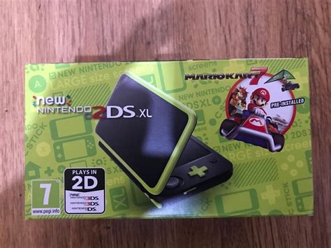 new nintendo 2ds xl black and lime green pre installed with mario kart 7 brand new sealed
