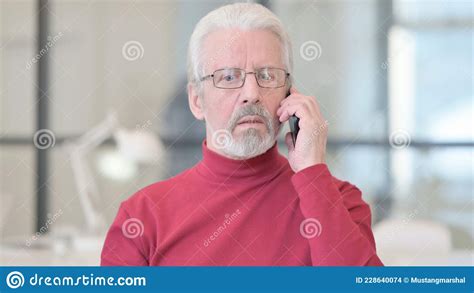 Portrait Of Old Man Talking On Phone Stock Photo Image Of Busy