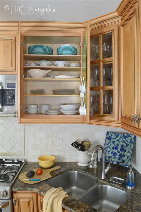 But if you are someone that can look at plans and visualize it, then you might want to give these plans a quick glance. How to Add Extra Shelves to Kitchen Cabinets - H2OBungalow