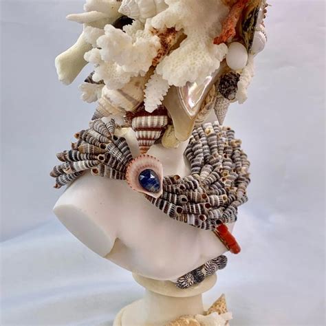 Miniature God Seashell Sculptures A Pair Chairish Seashell Art
