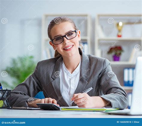 Young Businesswoman Accountant Working In The Office Stock Photo