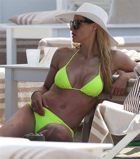 Top Celebrity Model Michelle Hunziker Sunbathing In Yellow The Best Porn Website