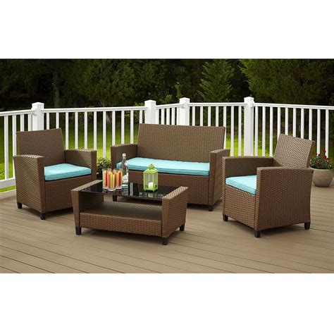 4 Piece Outdoor Patio Furniture Set In Brown Wicker Resin With Teal Cu