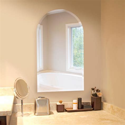 Made of iron and finished in a gold leaf. The Howard Elliott Collection 19 in. x 32 in. Arched ...