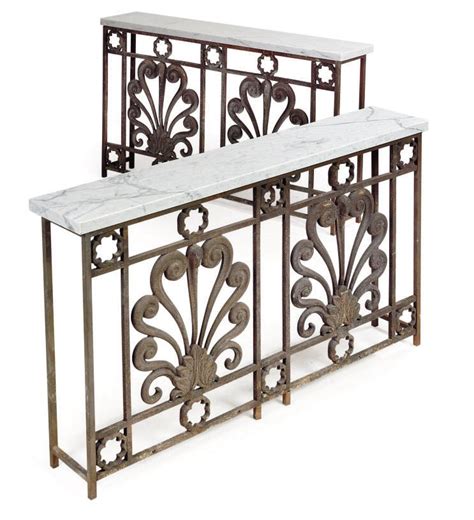 A Pair Of Cast And Wrought Iron Consoles