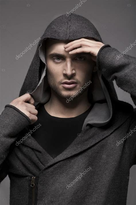 Handsome Young Man In A Hood — Stock Photo © Kakofonia 46489043