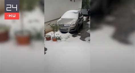 Traktorral kellett eltolni a félméteres jeget. Durva jégeső volt Peresznyén | 24.hu