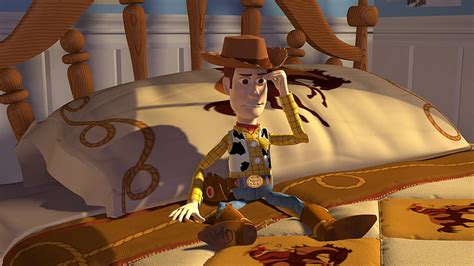 Hd Wallpaper Woody From Toy Story Sitting On White And Brown Bed