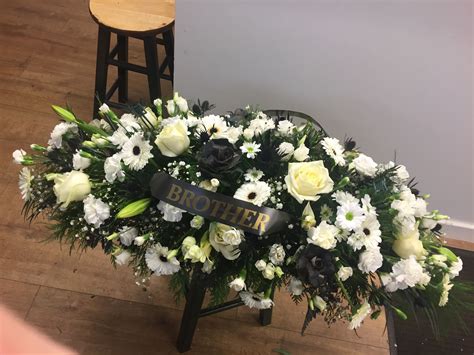 Funeral tribute, coffin oasis 4ft. Made by Butterflies and Blooms www