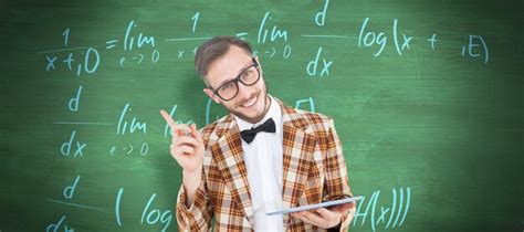 Premium Photo Geeky Hipster Holding A Tablet Pc Against Green Chalkboard
