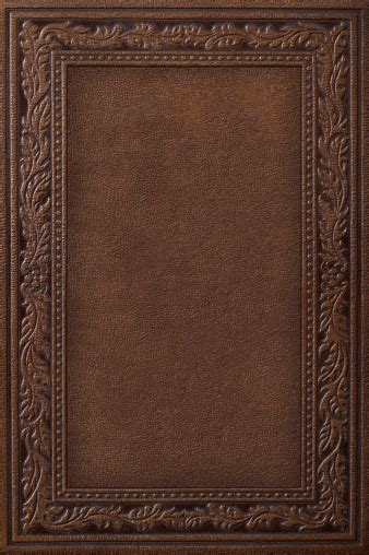 To sell the book by intriguing the right readers. Antique Leather Book Cover Stock Photo - Download Image ...