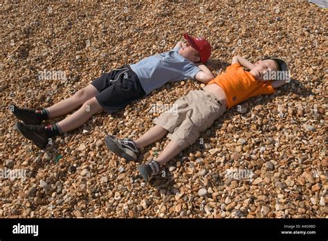 Babes Asleep On Beach Stock Photo Alamy