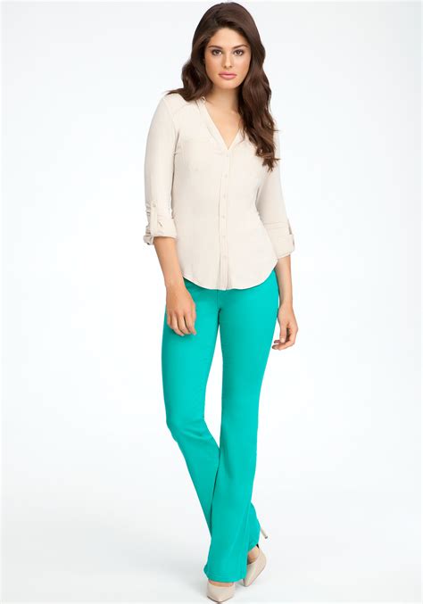 Lyst Bebe Flap Pocket Bootcut Jeans In Green