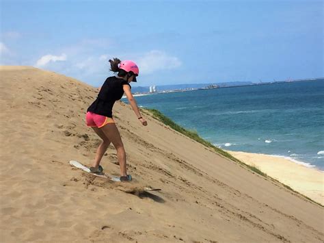 Sandboarding At The Tottori Sand Dunes National Parks Of Japan