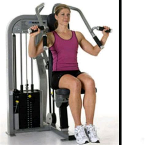 Shoulder exercises using cable machine. Seated Shoulder Press - Exercise How-to - Workout Trainer ...