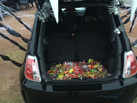 Trunk or Treat black widow spider trunk filled with candy -Christen