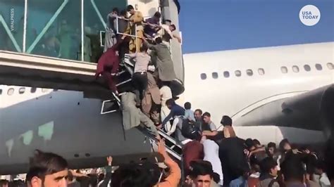 Afghans Flee To Airport After The Taliban Took Control Of The Capital