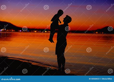 Father And Son Enjoying Life At Sunset Stock Image Image Of Enjoying Coast 50568023