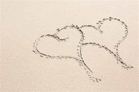 Free Photo Two Heart Shapes Drawn On Sand