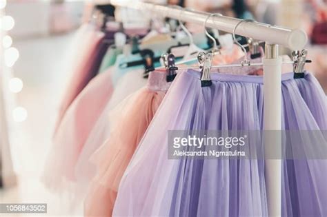 Clothing For A Little Girl On A Clothes Rack In A Wardrobe High Res
