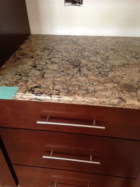 A Kitchen Counter Top With Two Drawers