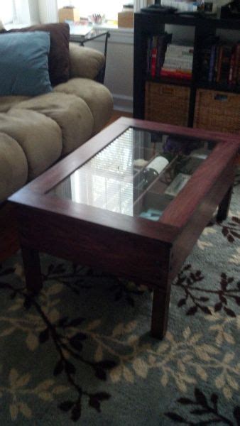 This glass display coffee table is custom built in the shape of a small boat. Coffee Table Shadow Box | Coffee table, Display coffee ...