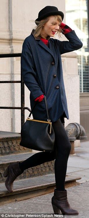 Taylor Swift Shows Off Her Long Legs In Black Tights In New York