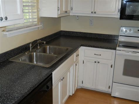 From classic and elegant to sleek and contemporary, we specialize in designing all different kinds of kitchen that fit to your style. laminate countertops with white cabinets | ... Countertops ...