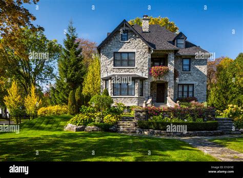 A Large Home With Fall Foliage Color In Quebec City