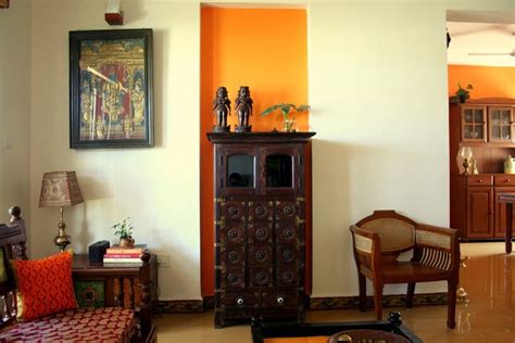 Decorating your living room walls with photographs of your family and life adds a sense of comfort or warmth to the living space. Ethnic Indian Decor: An Indian home in Bangalore
