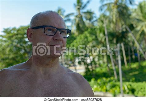 Mature Handsome Tourist Man Shirtless At The Beach Portrait Of Mature Handsome Tourist Man