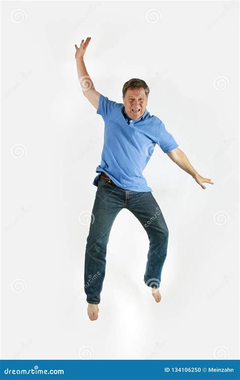 Man Jumps In The Air Stock Photo Image Of Blue Polo 134106250