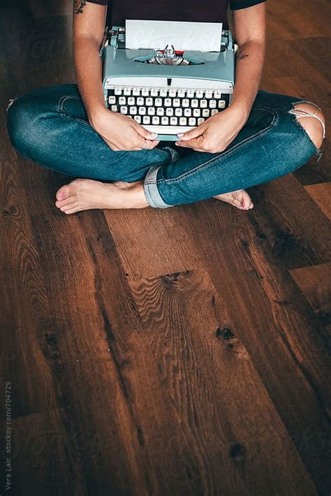 Woman With A Blue Typewriter By Stocksy Contributor Vera Lair