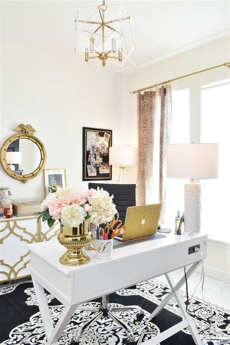 A Stunning Home Office With Perfect Lighting And Black White And Gold