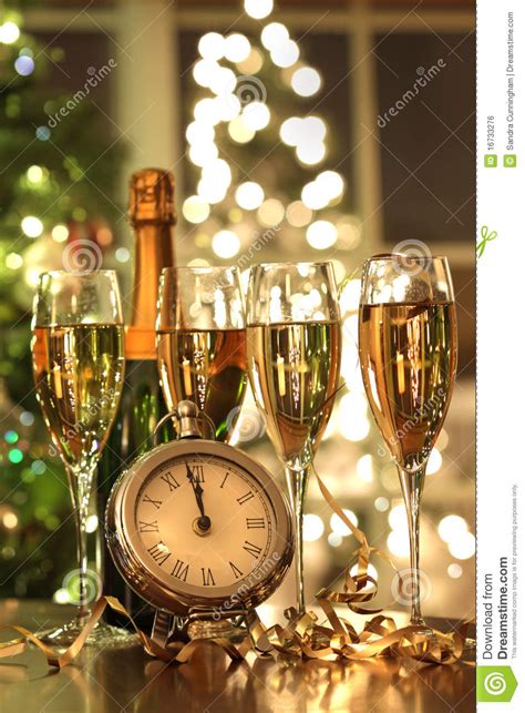 See more ideas about new year's eve love the sparkly gold addition to the rim of these champagne glasses. Four Glasses Of Champagne Ready For The New Year Stock ...