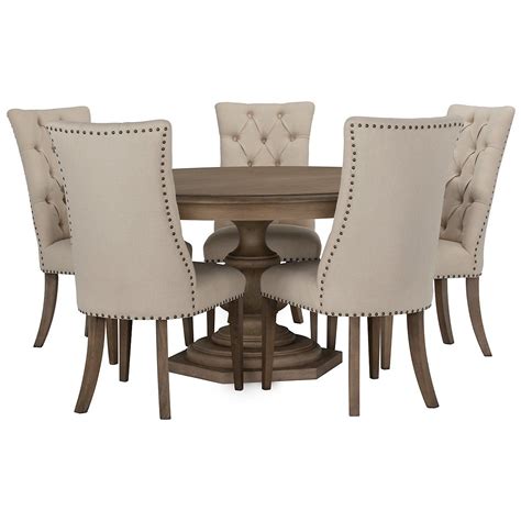 The width of your table should typically, as the table length increases, so does the width of the table top. Includes: Round dining table and four upholstered chairs ...