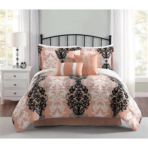 The deep vibrant color of red combined with black provides a blunt punch to a room, especially when the bed is a larger queen or king size. Carmela Home Downton 7-Piece Reversible Coral Queen ...