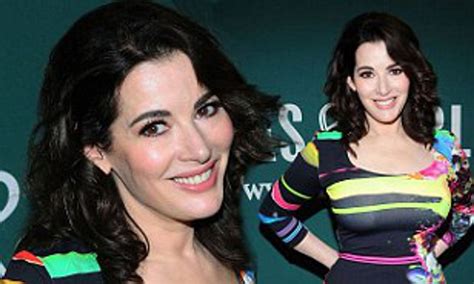 talk about attention grabbing nigella lawson stands out in multicoloured skintight dress as she