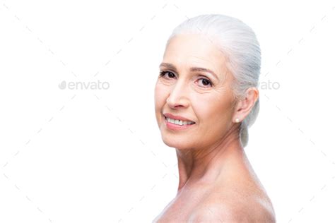 Beautiful Smiling Naked Senior Woman Isolated On White Stock Photo By LightFieldStudios