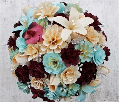 Stunning wedding centerpiece with floating tiffany blue candle lights. Burgundy and Tiffany Blue Wedding: Bridal Bouquet Made of ...