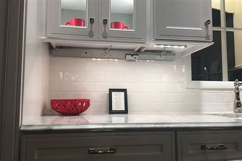 Adorne under cabinet lighting system. Modular Track for Direct Wire power strips from the adorne ...