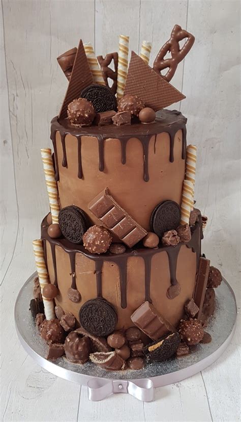 You can challenge your friends and family online can you beat them while you play sports games, board games, and more in this collection of free online games? Chocolate drip cake 2 tier | Chocolate bar cakes, Candy ...