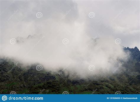 Clouds On A Mountainside Stock Image Image Of Clouds 131526033