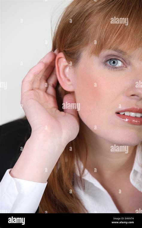 Woman Listening Carefully Stock Photo Alamy
